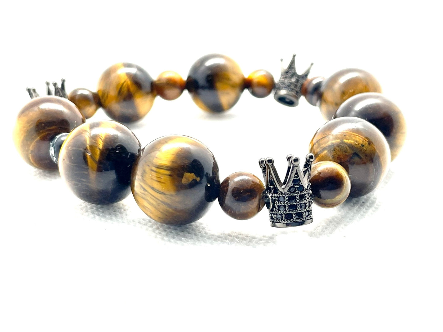 Triple Crown Triumph: Tiger's Eye Bracelet with Regal Symbolism - Organicmansion.com